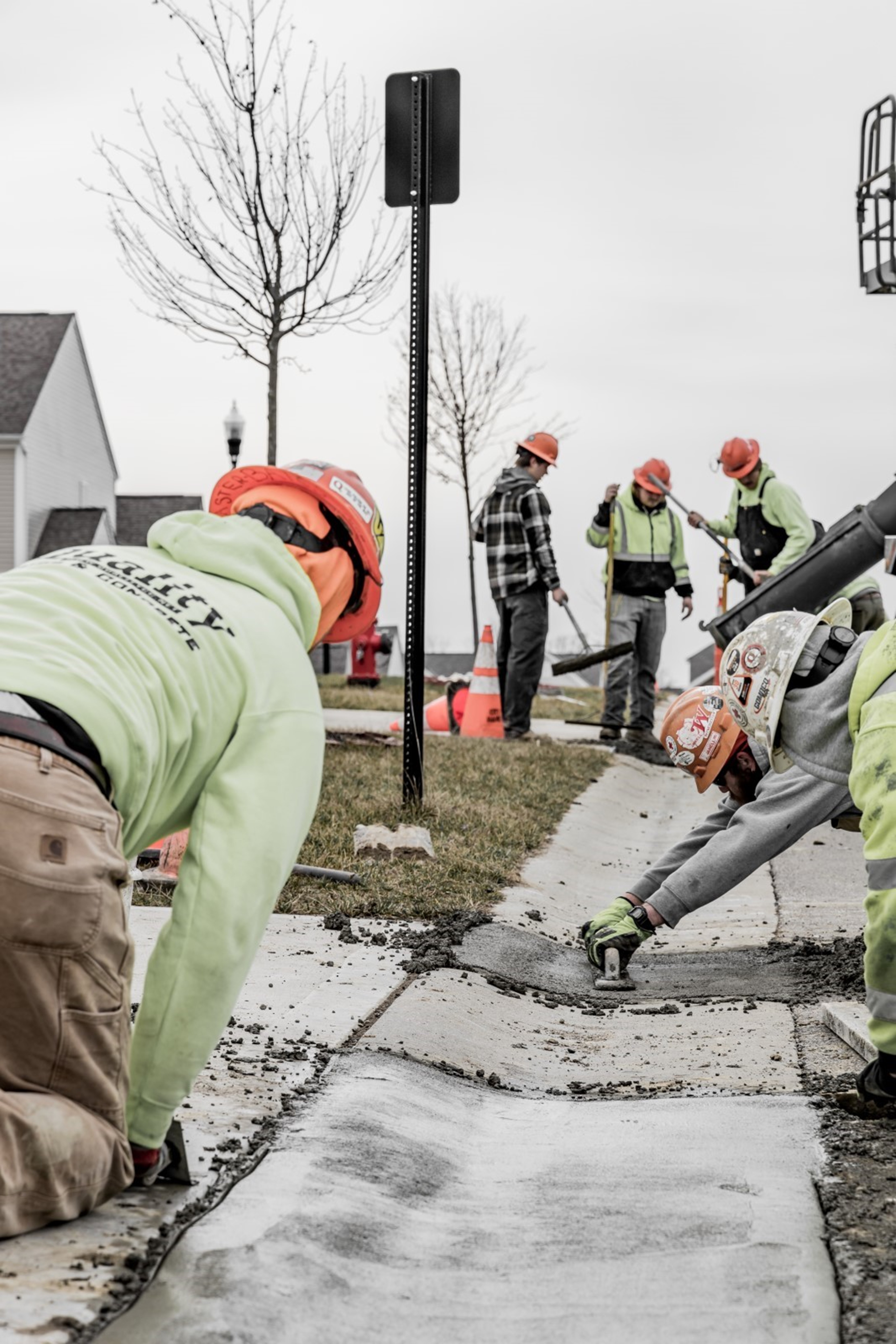 workers installing a curb